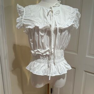 Flattering White Ruffled Blouse